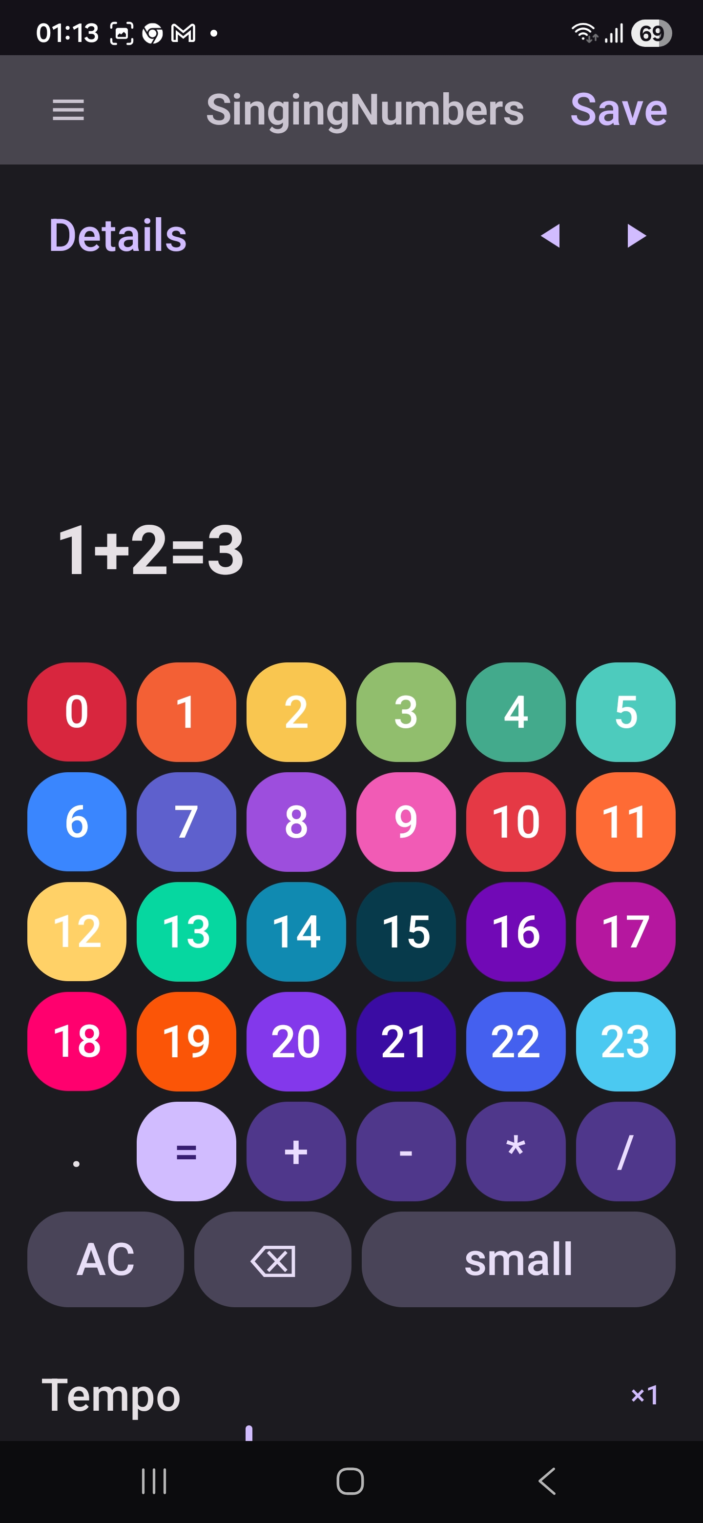 Big Calculator with 24 colored note keys and the expression 1+2=3
